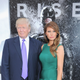 Donald and Melania Trump, with Batman looming in the background, at the July 16, 2012, New York premiere of “The Dark Knight Rises”